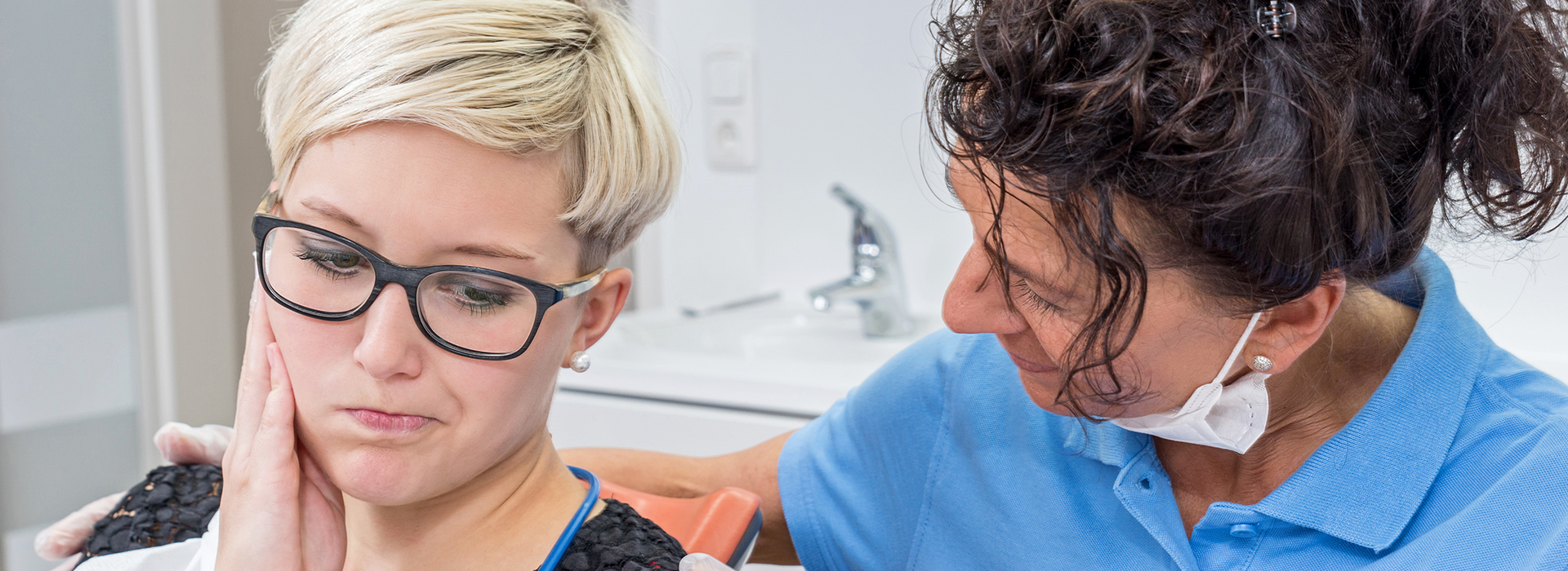 A split-screen photo showing a woman receiving dental care from a professional, with one half of the image displaying the patient and the other half featuring the dentist.